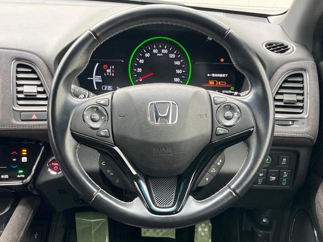 ヴェゼル ハイブリッドＲＳ・ホンダセンシング　ホンダセンシング　アダプティブクルコン　禁煙車　ハーフレザーシート　シートヒーター　スマートキー　ＬＥＤヘッド　ＥＴＣ　純正１８インチアルミ　車線逸脱警報　オートブレーキホールド　オートライト（12枚目）