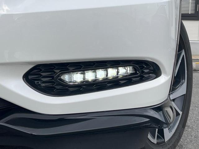 ヴェゼル ハイブリッドＲＳ・ホンダセンシング　ホンダセンシング　アダプティブクルコン　禁煙車　ハーフレザーシート　シートヒーター　スマートキー　ＬＥＤヘッド　ＥＴＣ　純正１８インチアルミ　車線逸脱警報　オートブレーキホールド　オートライト（26枚目）