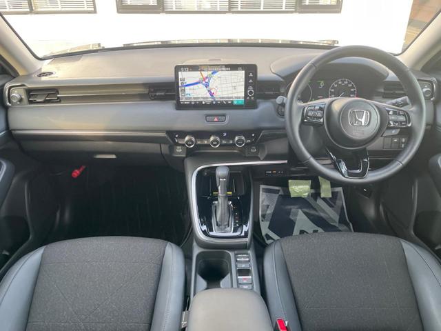 ヴェゼル ｅ：ＨＥＶ　Ｚ　純正９型ナビ　バックカメラ　ホンダセンシング　禁煙車　電動リアゲート　ハーフレザーシート（合皮）　シートヒーター　ドラレコ　シーケンシャルターンランプ　ブラインドスポットモニター　スマートキー　ＥＴＣ（2枚目）