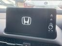 ZR-V e:HEV Z 登録済未使用車 9型ホンダコネクトディスプレイ 全周囲カメラ BOSEサウンド ホンダセンシング レーダークルコン 禁煙車 ハンズフリーパワーバックドア 黒革シート シートヒーター メモリーシート 中古車画像_3