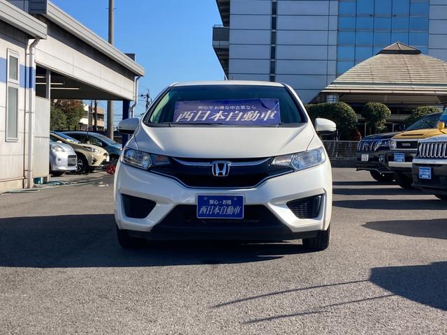 フィットハイブリッド Ｆパッケージ　純正ナビ　地デジ　Ｂｌｕｅｔｏｏｔｈ　バックモニター　オートリトラミラー　プッシュスタート　ＥＴＣ（4枚目）