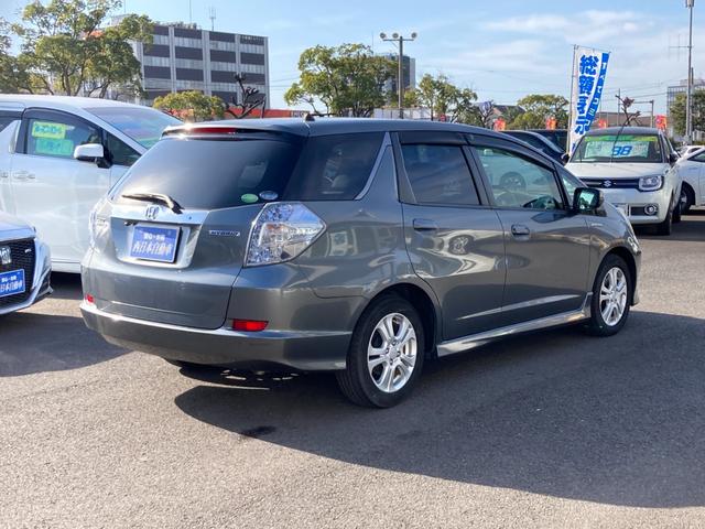 フィットシャトルハイブリッド ハイブリッド・スマートセレクション　イクリプスＳＤナビ　地デジ　Ｂｌｕｅｔｏｏｔｈ　バックモニター　革巻きハンドル　クルーズコントロール　ハーフレザーシート　ＥＴＣ　Ｍｏｄｕｒｏ１５ＡＷ（2枚目）