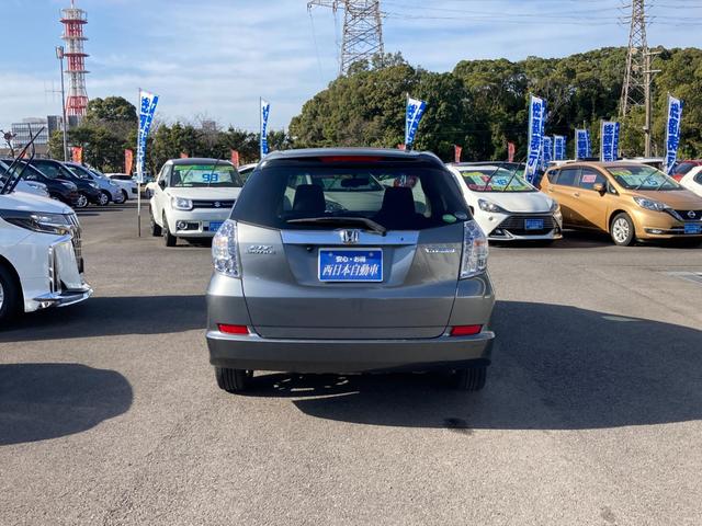 フィットシャトルハイブリッド ハイブリッド・スマートセレクション　イクリプスＳＤナビ　地デジ　Ｂｌｕｅｔｏｏｔｈ　バックモニター　革巻きハンドル　クルーズコントロール　ハーフレザーシート　ＥＴＣ　Ｍｏｄｕｒｏ１５ＡＷ（5枚目）