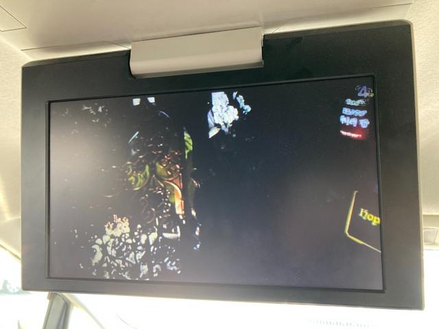 エスティマ アエラス　フリップダウンモニター　７人乗り　純正ＳＤナビ　地デジ　Ｂｌｕｅｔｏｏｔｈ　バックモニター　ドラレコ　両側パワースライド　革巻きハンドル　クルーズコントロール　レザー調シートカバー　オットマンシート（9枚目）