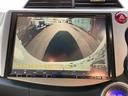スマートセレクション　純正９インチナビ　地デジ　バックモニター　革巻きハンドル　クルーズコントロール　レザー調シートカバー　前席シートヒーター　ＨＩＤ　ＥＴＣ（11枚目）