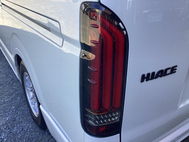 ハイエースバン スーパーＧＬ　ダークプライムＩＩ　６型　社外エアロ４点　アルパインＢＩＧＸ　両側パワースライドドア　ワンオーナー　ローダウン　社外ウインカーミラー　クリアランスソナー　トヨタセーフティセンス　オーバーフェンダー　ＬＥＤフォグランプ（11枚目）