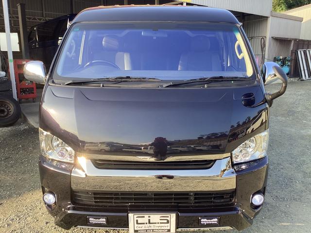 レジアスエースバン スーパーＧＬ　ダークプライム　４型　社外アルミホイール　バットフェイスボンネット　コートテクトガラス　ローダウン　ＬＥＤデイライト付きバンパーガード　フリップダウンモニター　社外テールランプ　ＬＥＤフォグランプ　ハンガーバー（8枚目）