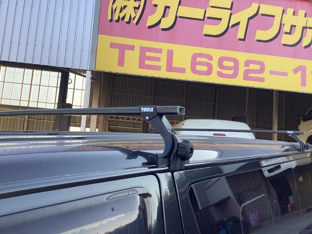 レジアスエースバン ロングＤＸ　４型　ワンオーナー　ＧＬパッケージ仕様　ミラー型バックモニター　ルーフキャリア　リアスライドガラス小窓　助手席エアバック　１００Ｖ電源　ビルトインＥＴＣ　内張レザー変更　ストラーダＨＤＤナビ　キーレス（9枚目）