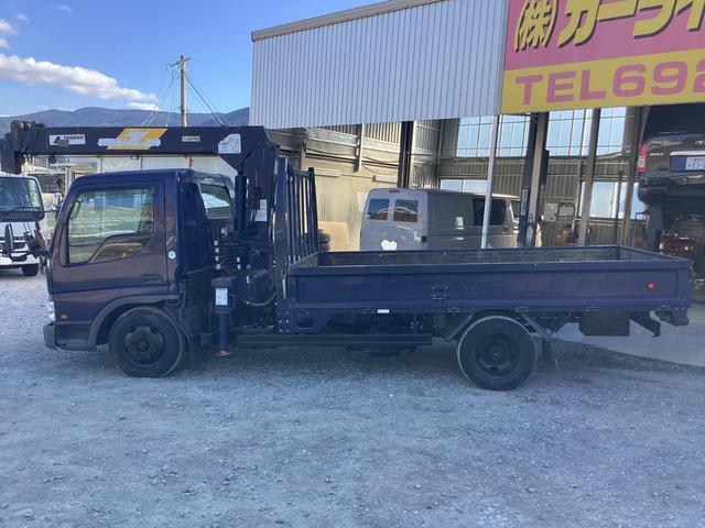 タイタントラック ロングワイドロー　平ボディー　クレーン付き　三方開　最積２ｔ　ダブルタイヤ　５速ミッション　パワーステアリング　エアバック（2枚目）