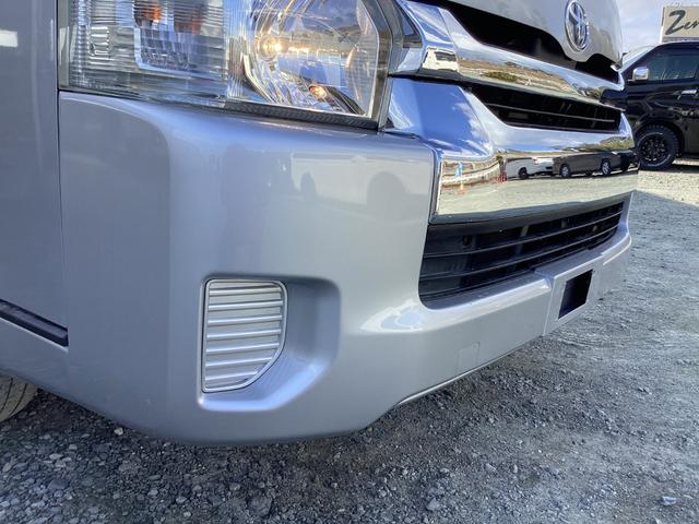 ハイエースバン SロングワイドDX 4型 GLパッケージ仕様 6人乗り リアスライドガラス小窓 ビルトインETC 内張レザー変更 バックカメラ メッキ電動格納ミラー メッキグリル レベライザー 純正SDナビ 同色バンパー(13枚目)