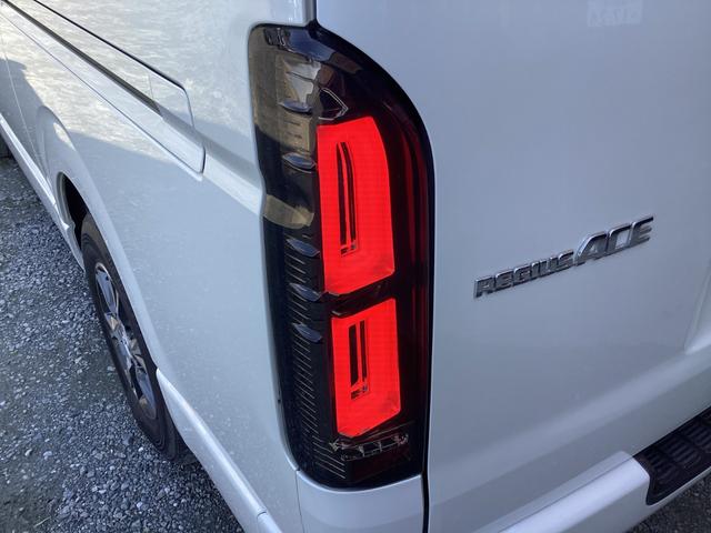 レジアスエースバン スーパーＧＬ　５型　両側パワースライドドア　社外テールランプ　モデリスタフロントスポイラー　純正ＬＥＤヘッドライト　プッシュスタート　トヨタセーフティセンス　純正アルミホイール　純正セキュリティ　ビルトインＥＴＣ（9枚目）