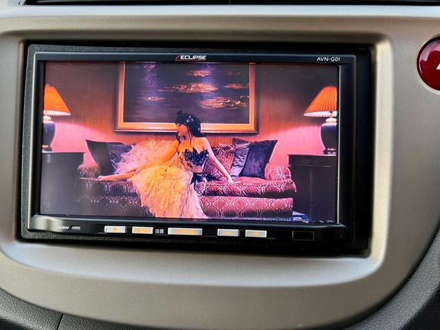 フィットハイブリッド ベースグレード　全国１年保証付　メモリーナビ　フルセグＴＶ　ＥＴＣ　バックカメラ　キーレスエントリー　アイドリングストップ　クルーズコントロール　盗難防止システム　安全衝突ボディ　ＤＶＤ再生　ＣＤ　フルフラット（31枚目）