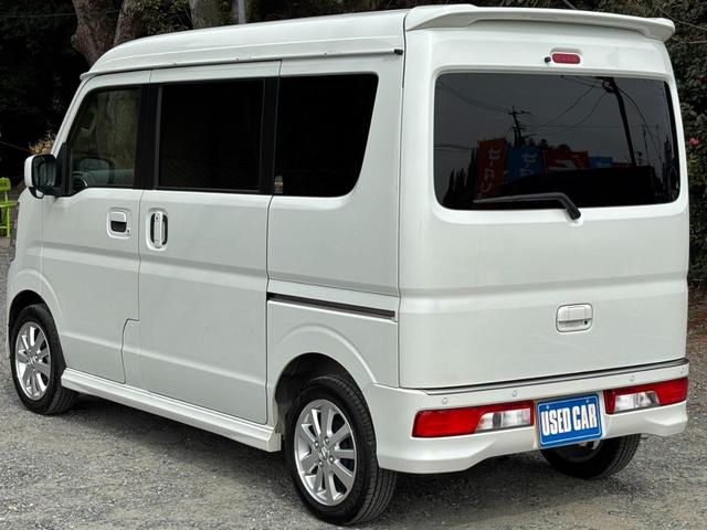ＮＶ１００クリッパーリオ Ｅ　メモリーナビ　左パワードア　新車保証書　衝突軽減ブレーキ　コーナーセンサー　レーン逸脱警報　Ｂｌｕｅｔｏｏｔｈ　ＴＶ　ＤＶＤ　シートヒーター　リアヒーター　フルエアロ　ターボ　ＵＳＢ入力　ＥＴＣ　ＨＩＤライト　フォグ　オートライト　純正１４ＡＷ　スマートキー（9枚目）