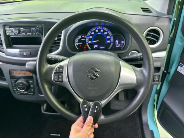 ワゴンＲ ＦＸリミテッド　保証書／衝突安全装置／シートヒーター／ＥＢＤ付ＡＢＳ／アイドリングストップ／エアバッグ　運転席／エアバッグ　助手席／アルミホイール　純正　１４インチ／パワーウインドウ／キーレスエントリー　盗難防止装置（11枚目）