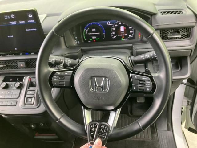 ステップワゴン ｅＨＥＶスパーダ　新品タイヤ／純正　１１インチ　ＳＤナビ／フリップダウンモニター　純正　１５．６インチ／ホンダセンシング／両側電動スライドドア／シートヒーター／マルチビューカメラシステム／車線逸脱防止支援システム（16枚目）