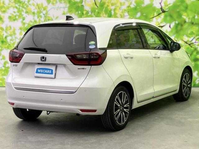 フィット ｅＨＥＶリュクス　保証書／純正　８インチ　ＳＤナビ／ホンダセンシング／シートヒーター　前席／車線逸脱防止支援システム／シート　ハーフレザー／ヘッドランプ　ＬＥＤ／Ｂｌｕｅｔｏｏｔｈ接続／ＥＴＣ／ＥＢＤ付ＡＢＳ（3枚目）