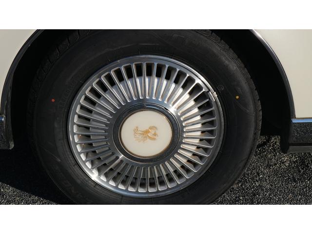 標準仕様車 デュアルEMVパッケージ 新車時オーダーパールホワイト・オプションブロンズガラス・オーキッド内装色・後期仕様・エアサスコントローラー・タイヤ4本新品・地デジ・純正ドアミラー(11枚目)