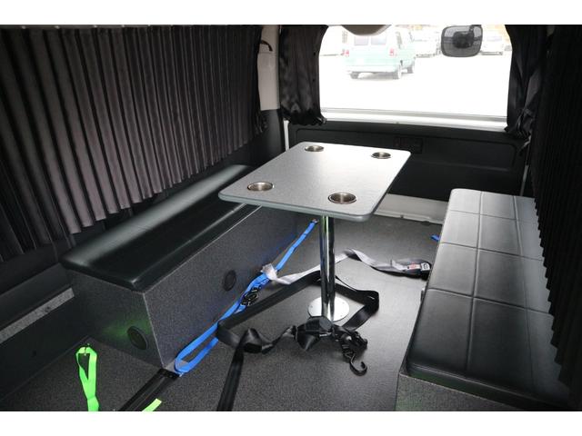 ハイエースワゴン グランドキャビン　モデリスタウインチ　荷台仮装済み　ベット　対面シート　　テーブル　１０人乗り　車いす登録　車いすラダー床下収納（24枚目）