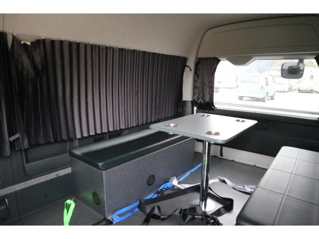 ハイエースワゴン グランドキャビン　モデリスタウインチ　荷台仮装済み　ベット　対面シート　　テーブル　１０人乗り　車いす登録　車いすラダー床下収納（25枚目）