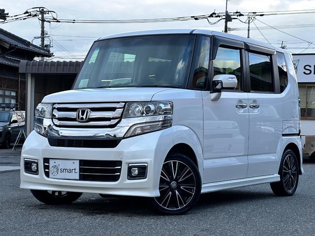 Ｎ－ＢＯＸカスタム Ｇ　ＳＳパッケージ　両側パワースライドドア　ＳＤナビ　フルセグ　Ｂｌｕｅｔｏｏｔｈ　ＤＶＤ再生　ＣＤ　バックカメラ　ＥＴＣ　ＨＩＤヘッドライト　フォグ　社外１５インチアルミ　電動格納ミラー　ベンチシート（3枚目）