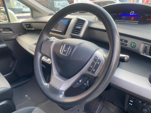 フリードハイブリッド ジャストセレクション パワースライドドア SDナビ フルセグ Bluetooth DVD再生 CD スマートキー HIDヘッドライト 社外15インチアルミ(25枚目)