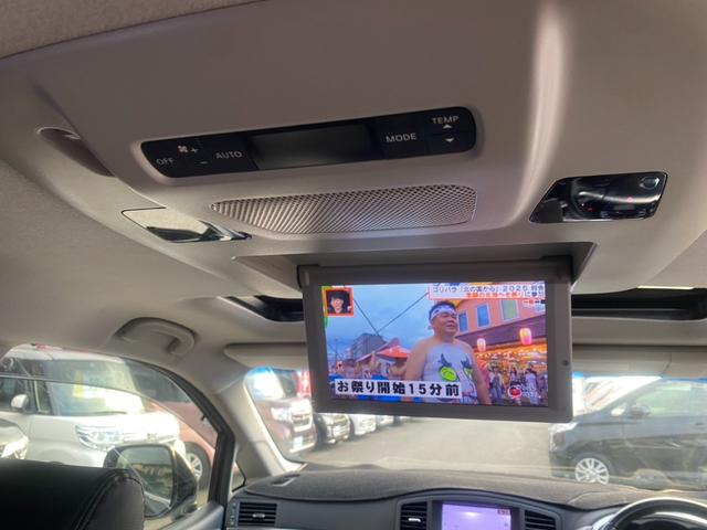 エルグランド ２５０ハイウェイスターアーバンクロム　サンルーフ／全方位カメラ／純正ナビ／フルセグ／ＤＶＤ再生／フリップダウンモニター／両側電動スライドドア／レザー調シートカバー／プッシュスタート／スマートキー／ＨＩＤヘッドライト／フロントフォグランプ（26枚目）