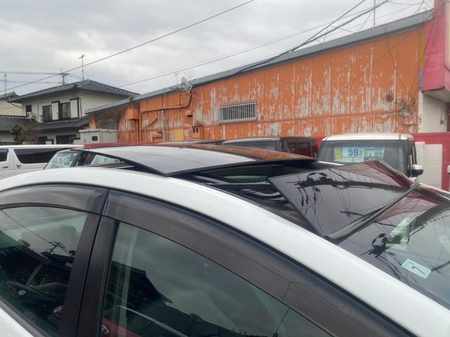 プリウス Ｓ　サンルーフ／純正ナビ／ワンセグ／ＤＶＤ再生／バックモニター／レザー調シートカバー／プッシュスタート／アイドリングストップ／スマートキー／社外１９インチＡＷ／盗難防止装置（34枚目）