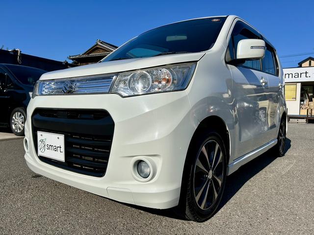 ワゴンＲスティングレー Ｔ　ＨＩＤヘッドライト　フォグ　アイドリングストップ　ウインカーミラー　電動ミラー　純正１５インチアルミホイール　プッシュスタート　スマートキー　プライバシーガラス　セキュリティアラーム　サイドバイザー（3枚目）