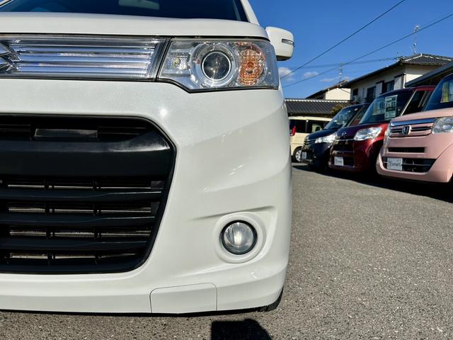 ワゴンＲスティングレー Ｔ　ＨＩＤヘッドライト　フォグ　アイドリングストップ　ウインカーミラー　電動ミラー　純正１５インチアルミホイール　プッシュスタート　スマートキー　プライバシーガラス　セキュリティアラーム　サイドバイザー（32枚目）