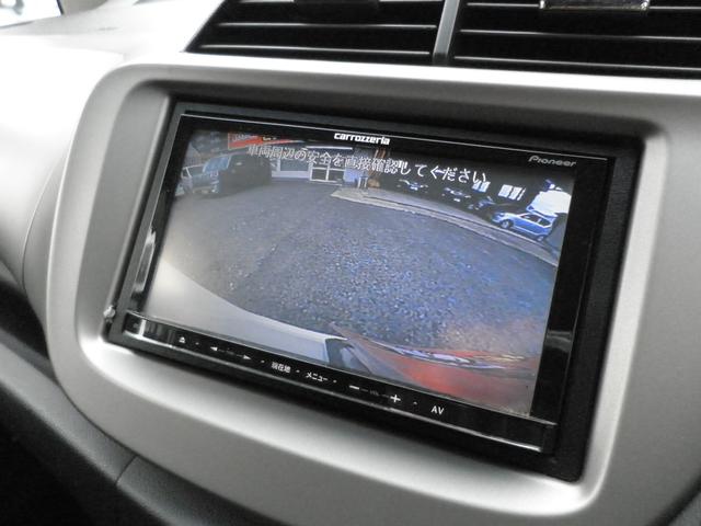 フィットハイブリッド スマートセレクション　バックカメラ　ナビ　ＴＶ　Ｂｌｕｅｔｏｏｔｈ接続　ＣＤ　ＤＶＤ　社外アルミホイール　オートライト　スマートキー　キーレスエントリー　電動格納ミラー　衝突安全ボディ　盗難防止システム（16枚目）
