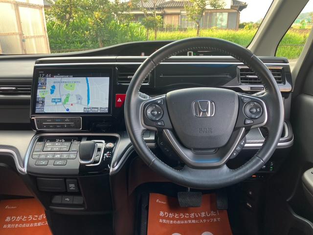 ステップワゴンスパーダ スパーダハイブリッド　Ｇ・ＥＸ　ホンダセンシング　ワンオーナー　ホンダセンシング　純正１０インチインターナビ　フルセグ　ブルートゥース　ＨＤＭＩ対応　純正１１．６インチ後席モニター　バックカメラ　両側電動スライドドア　前後ドラレコ　レーダークルーズ（19枚目）