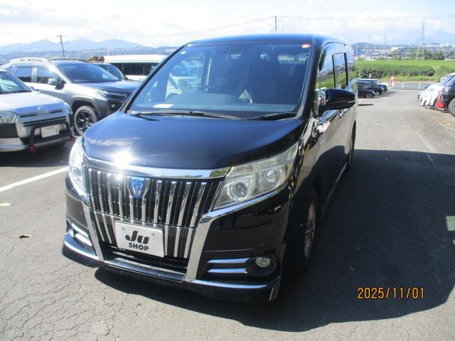 エスクァイア ハイブリッドＸｉ　純正９インチナビ　フリップダウンモニター　両側パワースライドドア　シートカバー　安全装備　プッシュスタート　シートヒーター　オートライト　ステアリングリモコン（3枚目）