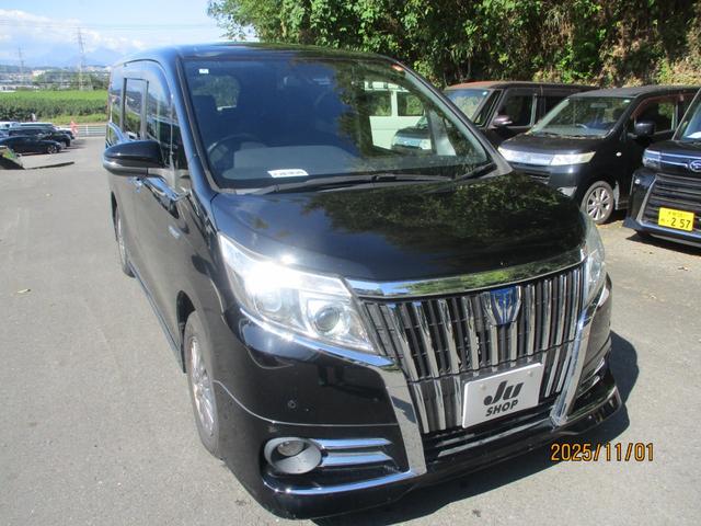 エスクァイア ハイブリッドＸｉ　純正９インチナビ　フリップダウンモニター　両側パワースライドドア　シートカバー　安全装備　プッシュスタート　シートヒーター　オートライト　ステアリングリモコン（5枚目）