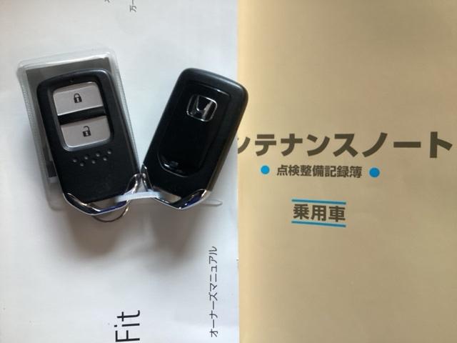 フィット １３Ｇ・Ｌパッケージ　ナビ　フルセグ　リヤカメラ　盗難警報装置　ＥＴＣ付き　アイスト　助手席エアバッグ　サイドＳＲＳ　リモコンキー　インテリキー　横滑り防止機能　Ｂカメ　ＡＵＴＯエアコン　パワーウインドウ　ドラレコ　ＡＢＳ（17枚目）