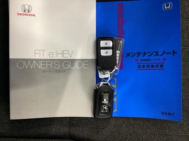 フィット ｅ：ＨＥＶホーム　純正ナビ　フルセグ　リアカメラ　前後誤発進抑制機能　助手席エアバッグ　運転席エアバッグ　アイドリングストップ　ＬＥＤライト　ＵＳＢ接続　バックカメラ　ＡＢＳ　サイドエアバッグ　スマートキー　ＤＶＤ再生（26枚目）