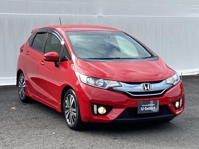 フィットハイブリッド Ｓパッケージ　メモリーナビ　ＥＴＣ　リアカメラ　点検記録簿　サイドエアバック　ＵＳＢ　ＶＳＡ　クルコン　地デジＴＶ　イモビライザー　パワーウィンドウ　スマキー　ＤＶＤ再生　ナビＴＶ　Ｗエアバック　パワステ　ＡＡＣ（8枚目）