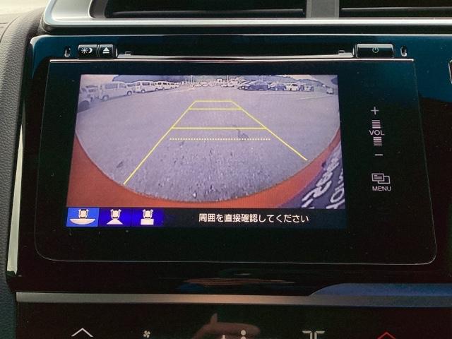 フィットハイブリッド Ｓパッケージ　メモリーナビ　ＥＴＣ　リアカメラ　点検記録簿　サイドエアバック　ＵＳＢ　ＶＳＡ　クルコン　地デジＴＶ　イモビライザー　パワーウィンドウ　スマキー　ＤＶＤ再生　ナビＴＶ　Ｗエアバック　パワステ　ＡＡＣ（12枚目）