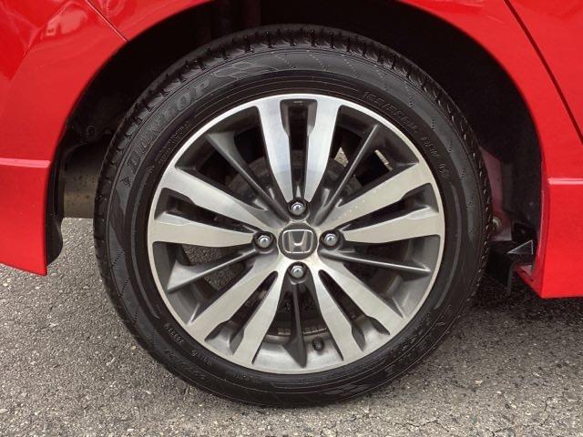 フィットハイブリッド Ｓパッケージ　メモリーナビ　ＥＴＣ　リアカメラ　点検記録簿　サイドエアバック　ＵＳＢ　ＶＳＡ　クルコン　地デジＴＶ　イモビライザー　パワーウィンドウ　スマキー　ＤＶＤ再生　ナビＴＶ　Ｗエアバック　パワステ　ＡＡＣ（21枚目）