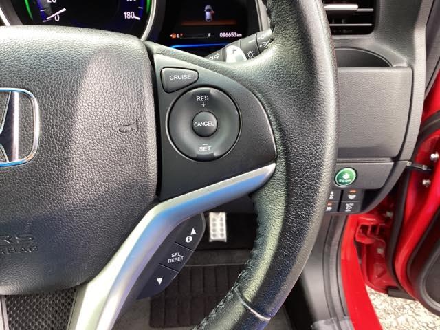 フィットハイブリッド Ｓパッケージ　メモリーナビ　ＥＴＣ　リアカメラ　点検記録簿　サイドエアバック　ＵＳＢ　ＶＳＡ　クルコン　地デジＴＶ　イモビライザー　パワーウィンドウ　スマキー　ＤＶＤ再生　ナビＴＶ　Ｗエアバック　パワステ　ＡＡＣ（36枚目）