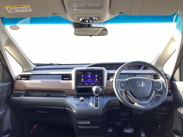 フリード クロスター・ホンダセンシング　ホンダ純正メモリーナビ　フルセグＴＶ　両ＰＳＤ　地デジ　エアバック　Ｉストップ　ＶＳＡ　リヤカメラ　ＤＶＤ再生　ウォークスルー　イモビライザー　キーフリー　パワステ　クルコン　ＡＡＣ　ＬＥＤライト（2枚目）