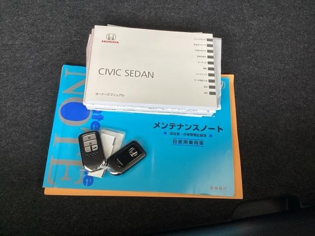 シビック セダン　純正メモリーナビ　本革パワーシート　サイドエアバッグ　ＤＶＤ視聴可能　横滑り防止装置　ＵＳＢ　地デジＴＶ　リアカメラ　クルーズコントロール　アイドリングストップ　スマキー　前席シートヒーター　ＡＢＳ（19枚目）