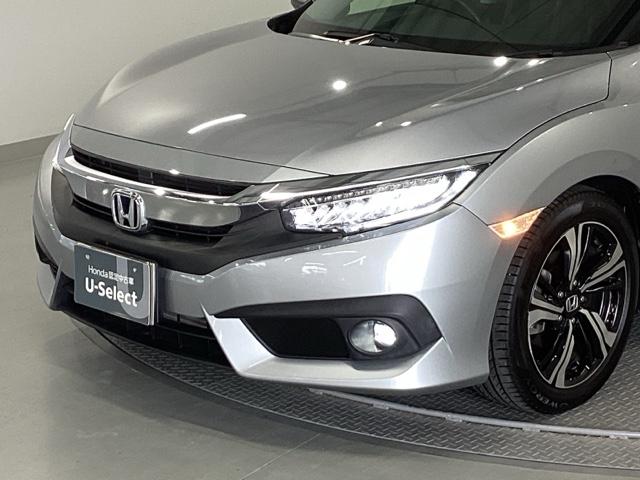 シビック セダン　純正メモリーナビ　本革パワーシート　サイドエアバッグ　ＤＶＤ視聴可能　横滑り防止装置　ＵＳＢ　地デジＴＶ　リアカメラ　クルーズコントロール　アイドリングストップ　スマキー　前席シートヒーター　ＡＢＳ（25枚目）