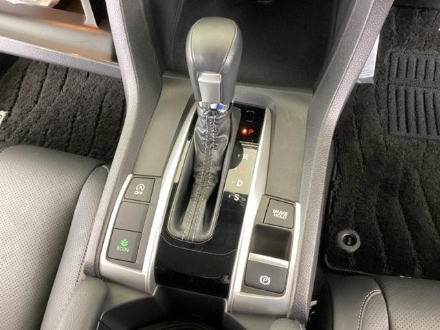 シビック セダン　純正メモリーナビ　本革パワーシート　サイドエアバッグ　ＤＶＤ視聴可能　横滑り防止装置　ＵＳＢ　地デジＴＶ　リアカメラ　クルーズコントロール　アイドリングストップ　スマキー　前席シートヒーター　ＡＢＳ（39枚目）