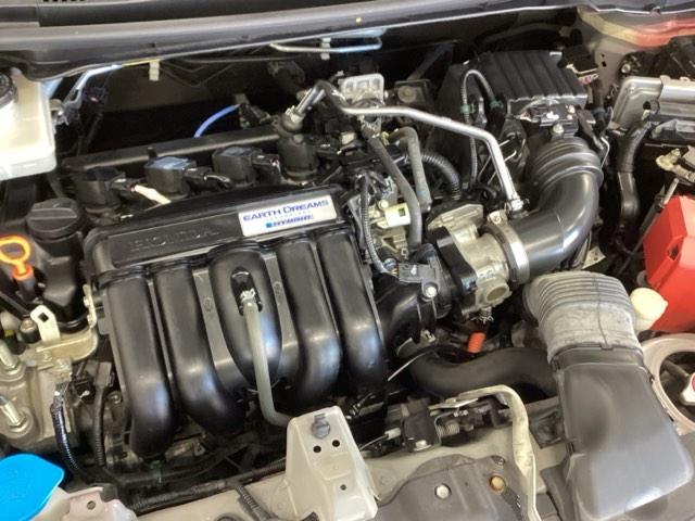 フィットハイブリッド F 純正ナビ フルセグ リアカメラ 地デジTV ナビTV 横滑り防止装置 フルオートエアコン イモビライザー キーフリーシステム 全席パワーウインドウ パワーステアリング アクティブクルーズ ABS(23枚目)