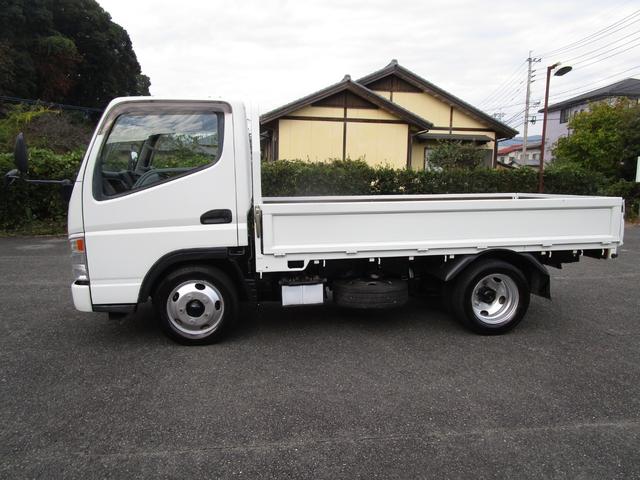 キャンター ２ｔ全低床平ボディー　・内外装クリーニング仕上・ワンオーナー車・車検時記録簿全有・運転席エアバック・ＡＢＳ・左側電動格納ミラー・イージーゴー（坂道発進装置）（4枚目）