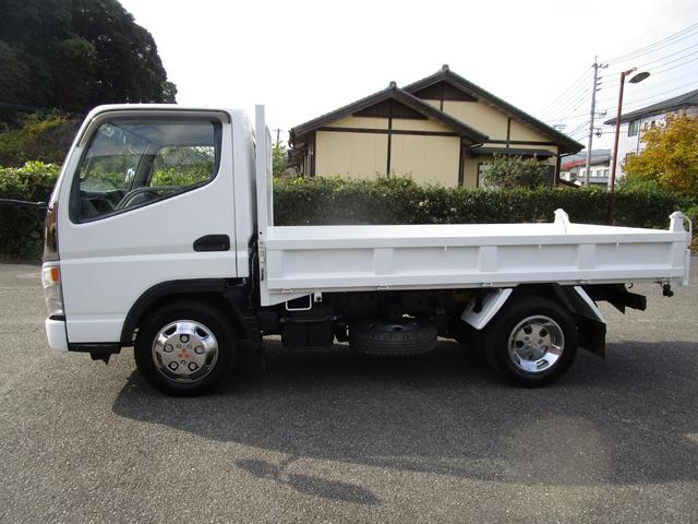 キャンター ２ｔ４ＷＤ全低床ダンプ　・内外装クリーニング仕上・ワンオーナー車・フルタイム４ＷＤ・あおり支柱無・メッキパーツ・ブリッジフック・運転席エアバック・ブリジストンミックスタイヤ６本（4枚目）