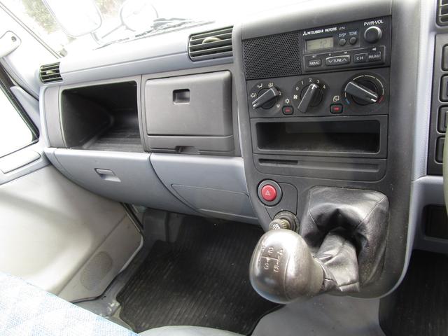 キャンター ２ｔ４ＷＤ全低床ダンプ　・内外装クリーニング仕上・ワンオーナー車・フルタイム４ＷＤ・あおり支柱無・メッキパーツ・ブリッジフック・運転席エアバック・ブリジストンミックスタイヤ６本（24枚目）