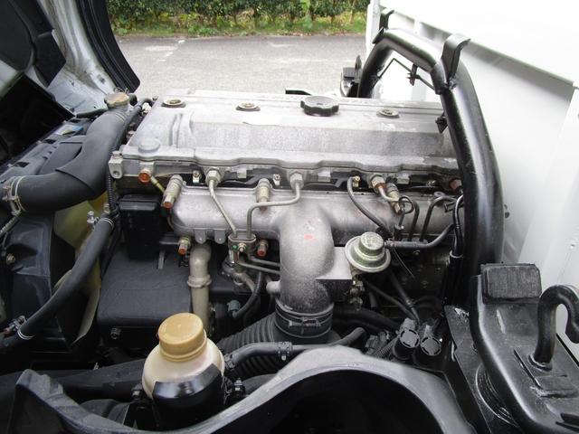 キャンター ２ｔ４ＷＤ全低床ダンプ　・内外装クリーニング仕上・ワンオーナー車・フルタイム４ＷＤ・あおり支柱無・メッキパーツ・ブリッジフック・運転席エアバック・ブリジストンミックスタイヤ６本（36枚目）