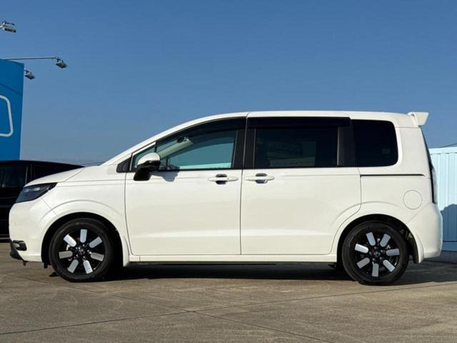 フリード ｅＨＥＶエアーＥＸ　新品タイヤ／純正　９インチ　メモリーナビ／ホンダセンシング／両側電動スライドドア／シートヒーター　前席／車線逸脱防止支援システム／パーキングアシスト　バックガイド／ヘッドランプ　ＬＥＤ　バックカメラ（2枚目）