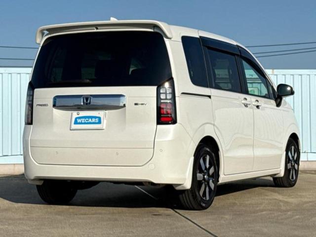 フリード ｅＨＥＶエアーＥＸ　新品タイヤ／純正　９インチ　メモリーナビ／ホンダセンシング／両側電動スライドドア／シートヒーター　前席／車線逸脱防止支援システム／パーキングアシスト　バックガイド／ヘッドランプ　ＬＥＤ　バックカメラ（3枚目）